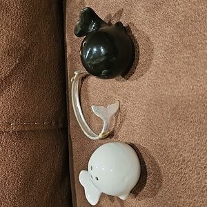 Adorable salt & pepper shakers & a whale tail cuff bracelet. All new.